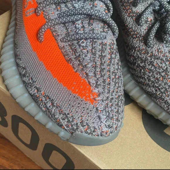 Adidas Gray and Orange Athletic Shoes with Boost Cushioning