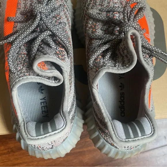 Adidas Gray and Orange Athletic Shoes with Boost Cushioning
