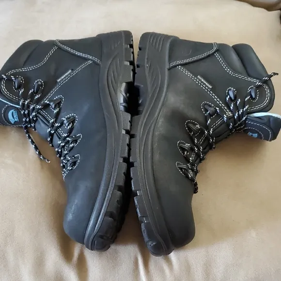 Black High-Top Leather Boots with Reinforced Toe