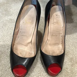 Black leather peep toe Christian Louboutin