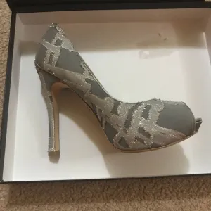 Brand new peep-toe shoes