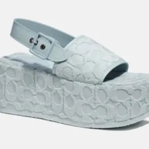 Coach Noelle platform sandals