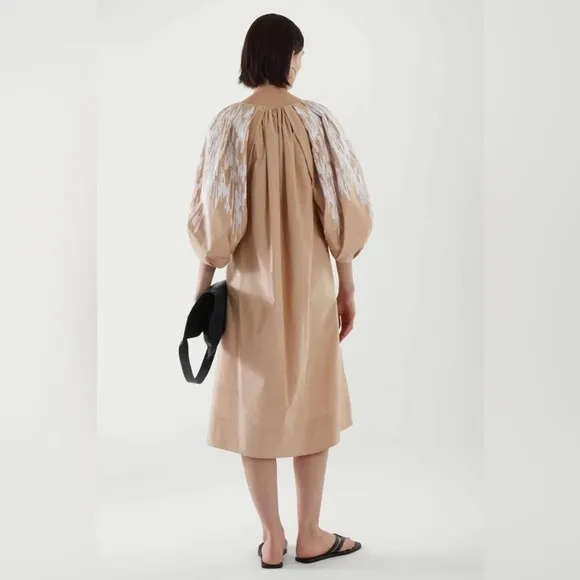 Embroidered puff sleeve Beige, and white dress, modern size small
