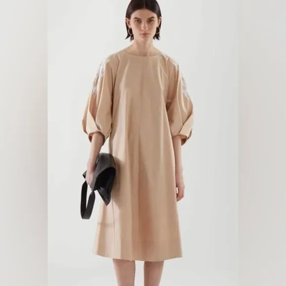 Embroidered puff sleeve Beige, and white dress, modern size small