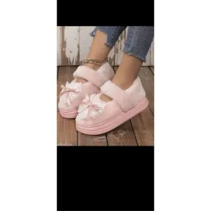 Fluffy Soft platform slipper with bow decor, non slip soles. They are so comfy !