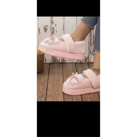 Fluffy Soft platform slipper with bow decor, non slip soles. They are so comfy !