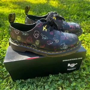 Hello Kitty Dr. Martens Black Dress Shoes with Iconic Round Toe