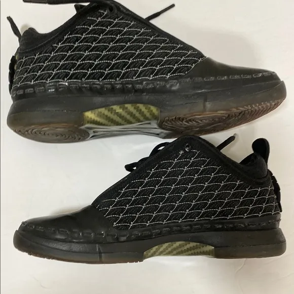 Jordan Black and Gray Athletic Shoes with Sleek Design