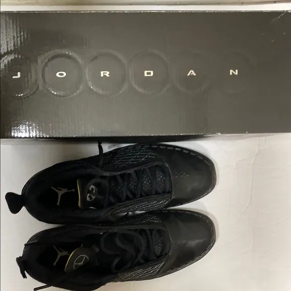 Jordan Black and Gray Athletic Shoes with Sleek Design