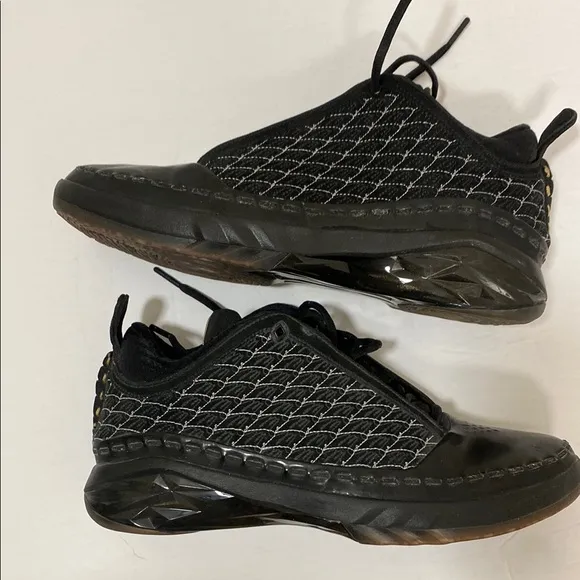 Jordan Black and Gray Athletic Shoes with Sleek Design