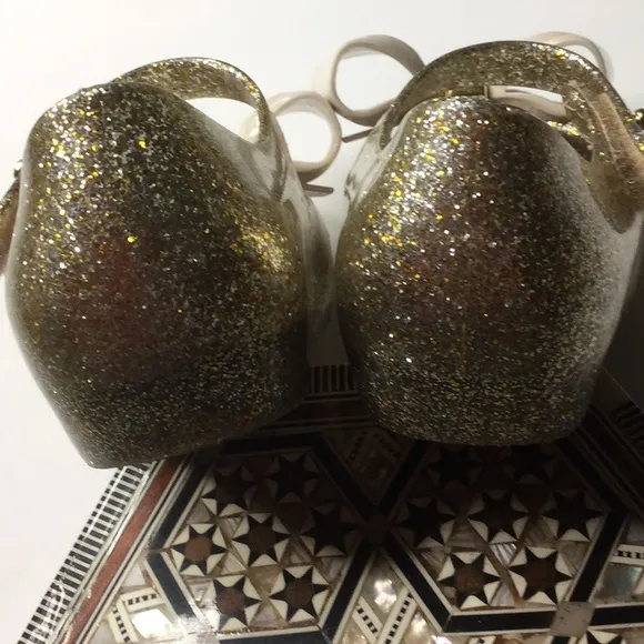 Mini Melissa gold glitter Ultragirl bow jelly flat