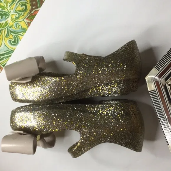 Mini Melissa gold glitter Ultragirl bow jelly flat