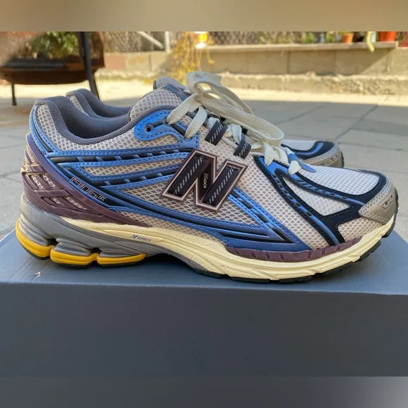 New Balance Blue and White Athletic Shoes with Mesh Upper