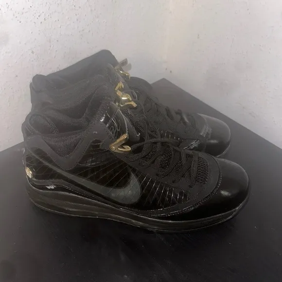 Nike Black and Gold Athletic High-Top Shoes
