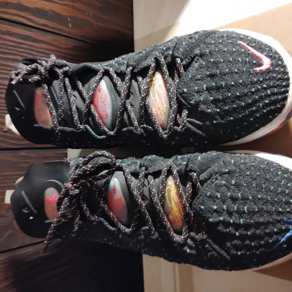Nike Black and Pink Athletic Shoes with Textured Knit Design