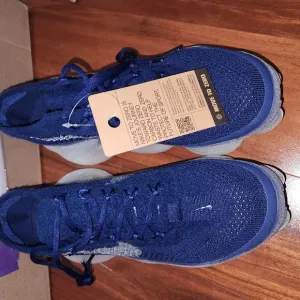 Nike Blue Athletic Sneakers with Breathable Knit Upper