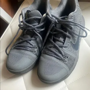Nike Gray Athletic Shoes Lightweight Breathable Design