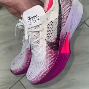 Nike White and Pink Vaporfly 3 Athletic Shoes with Gradient Design