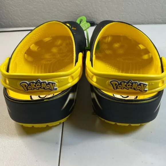 NWOB CROCS Youth Unisex Pokemon Pikachu Yellow Black Classic Clogs - Size J5