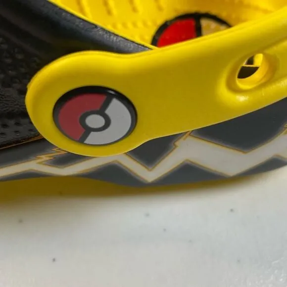 NWOB CROCS Youth Unisex Pokemon Pikachu Yellow Black Classic Clogs - Size J5
