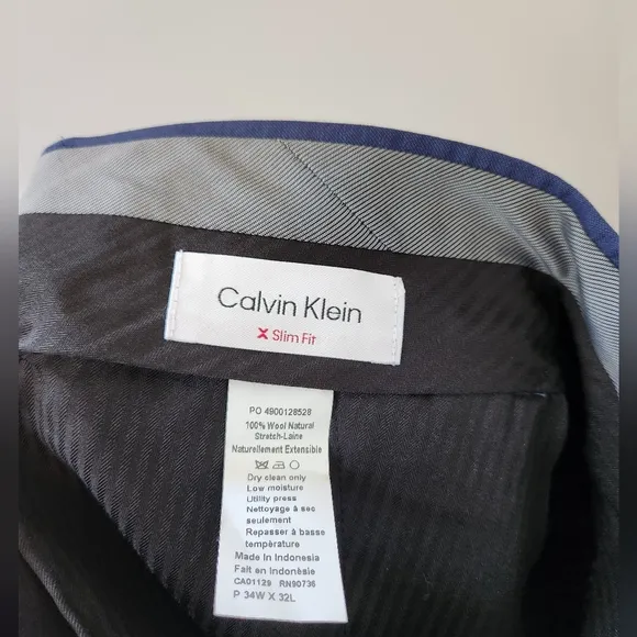 NWT Calvin Klein 34x32 Men’s ‘Jerome’ modern slimfit blue flat-front dre…