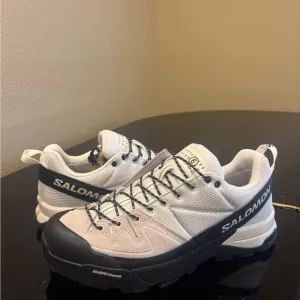 Salomon White and Black Athletic Shoes for Trail Adventures