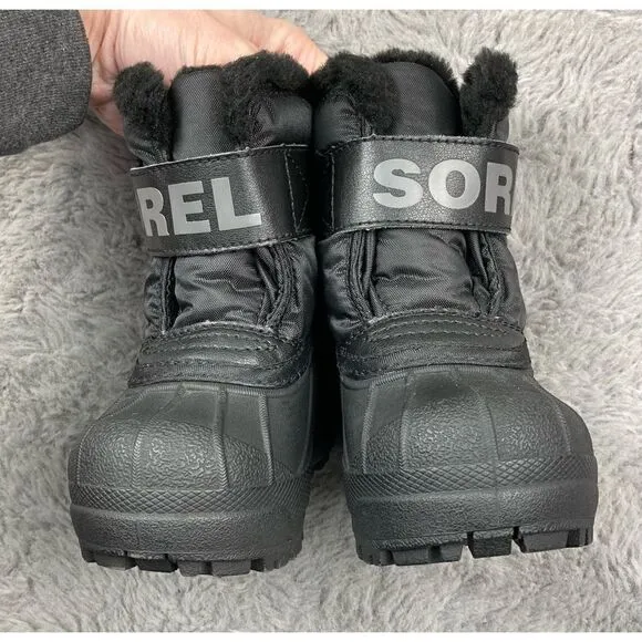 Sorel black  snow commander boots