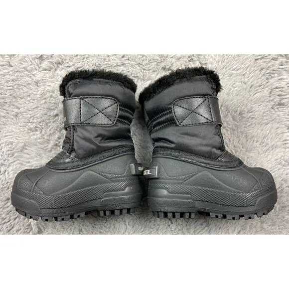 Sorel black  snow commander boots
