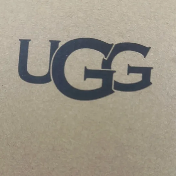 UGG Tan and Cream Sheepskin Funkette Slippers… new condition!