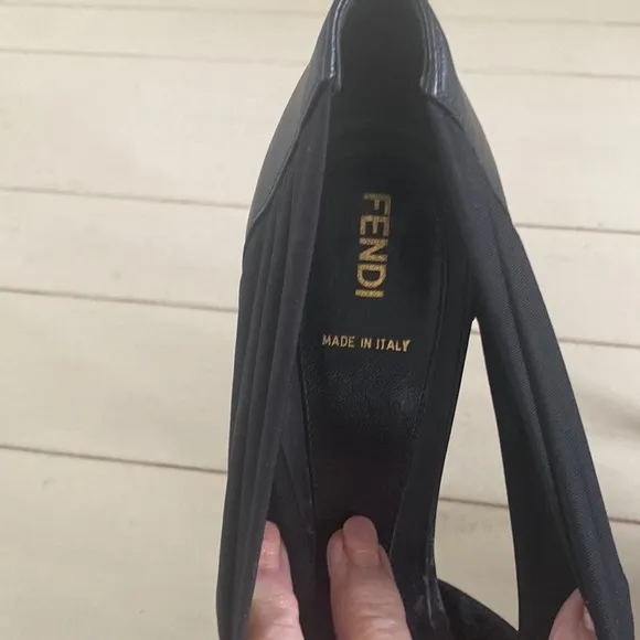 Women’s Open toe stilettos in size 40. Color is black. Med by Fendi.